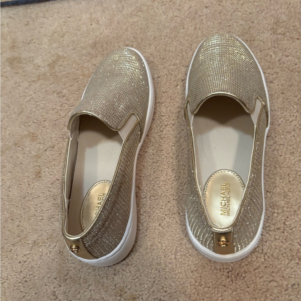 Michael Kors gold mesh slip ons